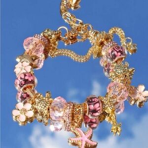 Elegant Gold and Pink Charm Bracelet